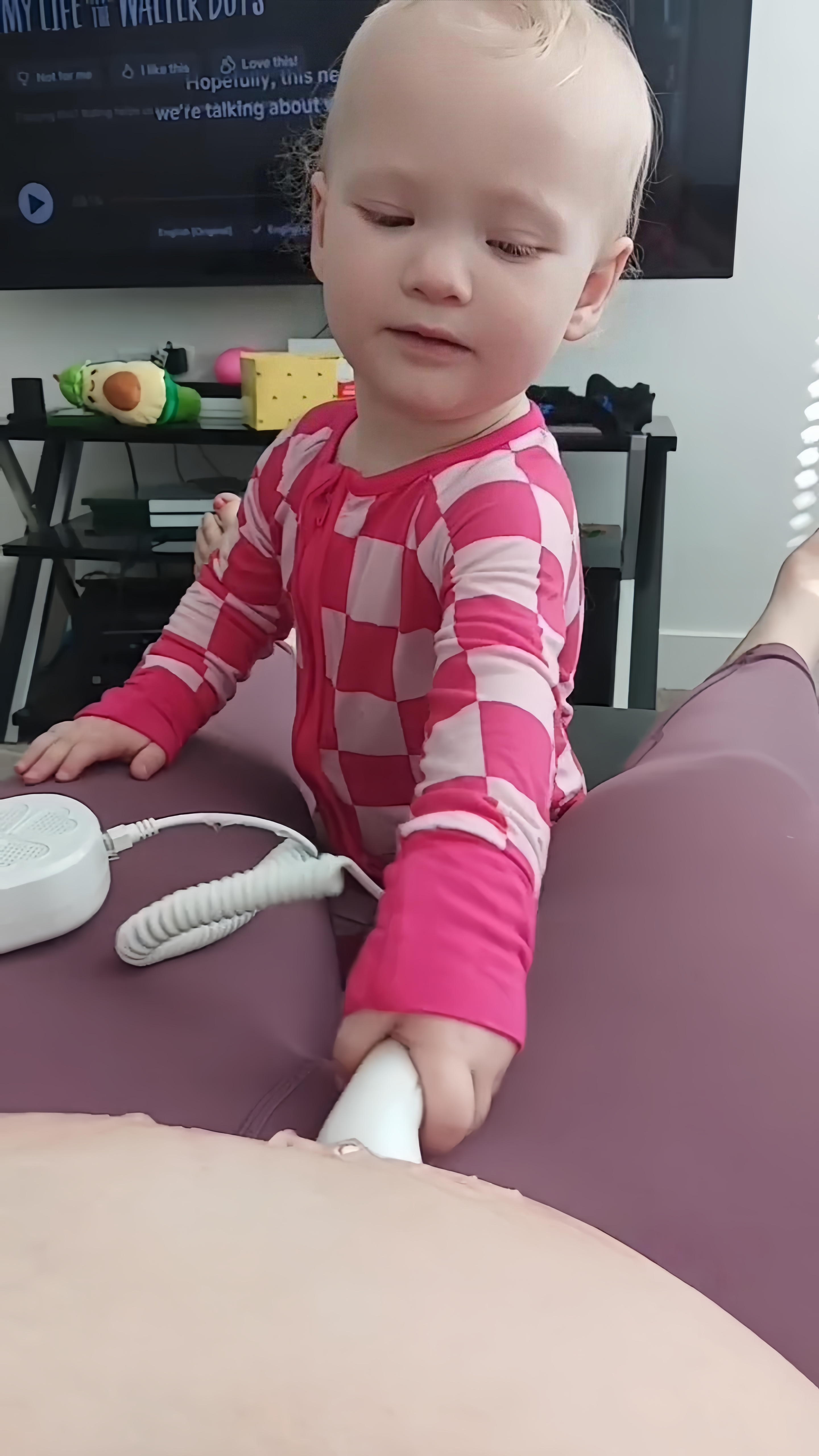 Family sharing a baby heartbeat moment with BabyEcho fetal doppler